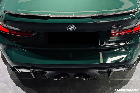 2021-UP BMW M4 G82/G83 MP Style Carbon Fiber Middle Rear Lip with Caps - Carbonado Aero